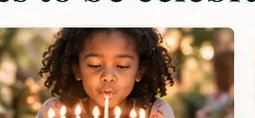 Child blowing out birthday candles